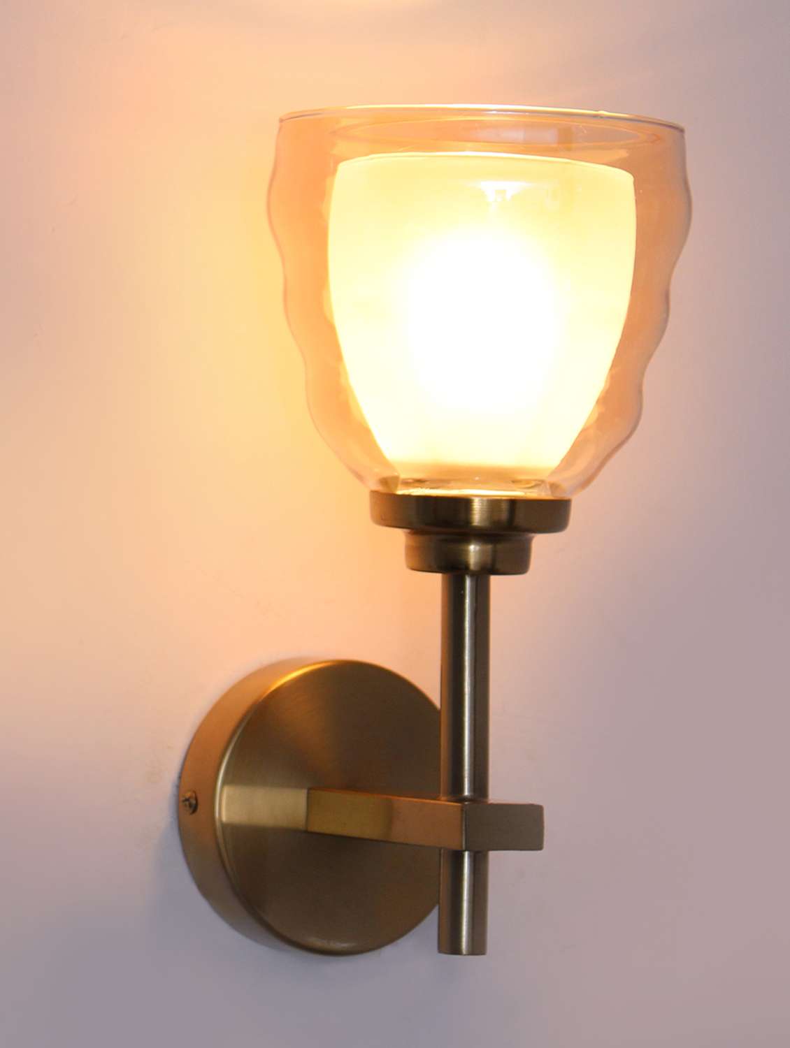 classic golden wall light with antique brass finish