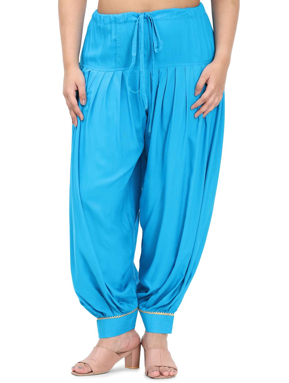 women blue solid mid rise salwar