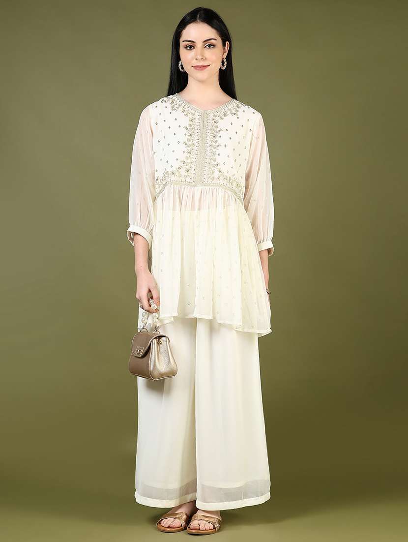 women embroidered kurta and palazzo set