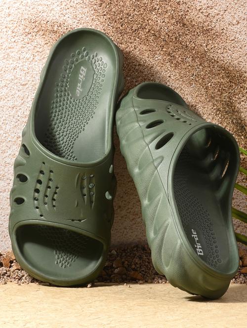men green slip on slider - 21844396 -  Standard Image - 0