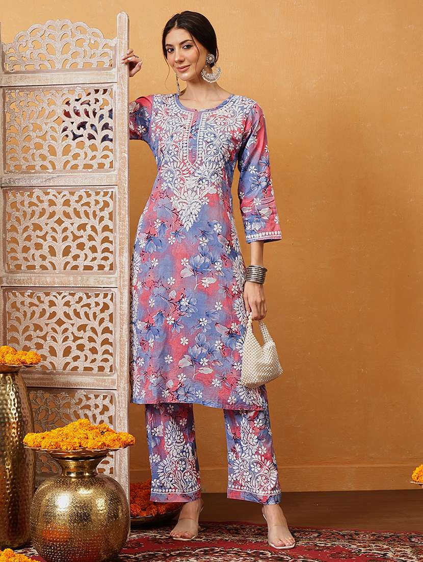 women solid with work round neck kurta set