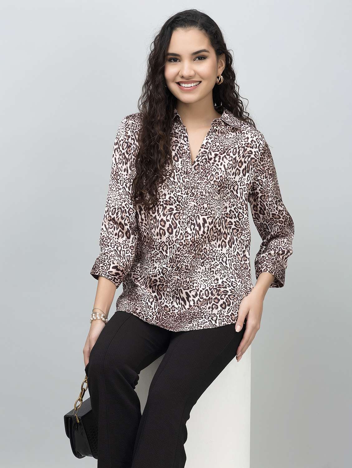 women animal printed collared high low top