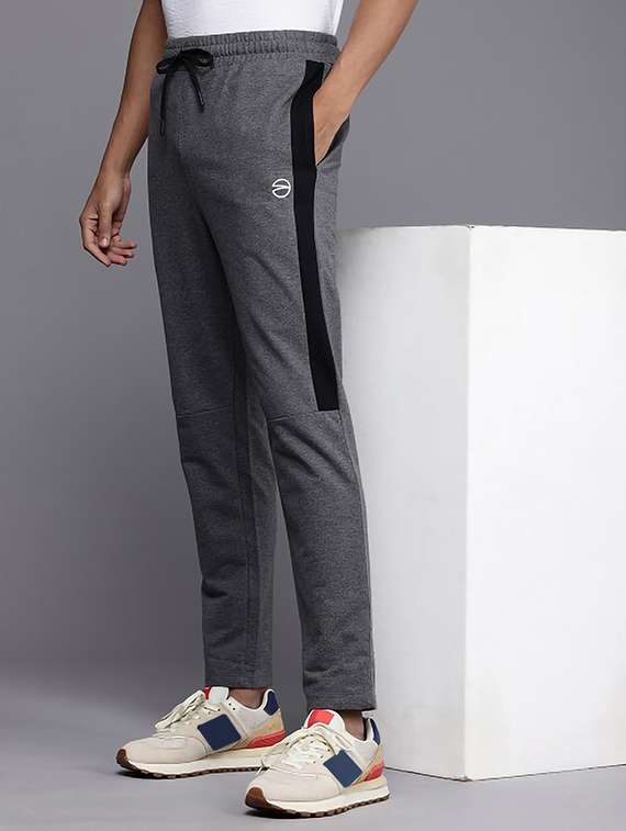 men side taped mid rise full length track pant