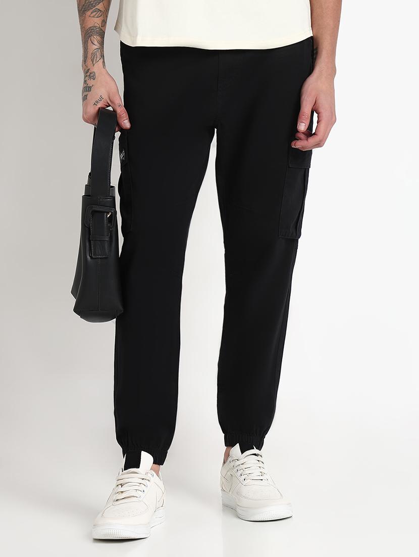 men solid mid rise relaxed fit jogger - 21908893 - Zoom Image - 0