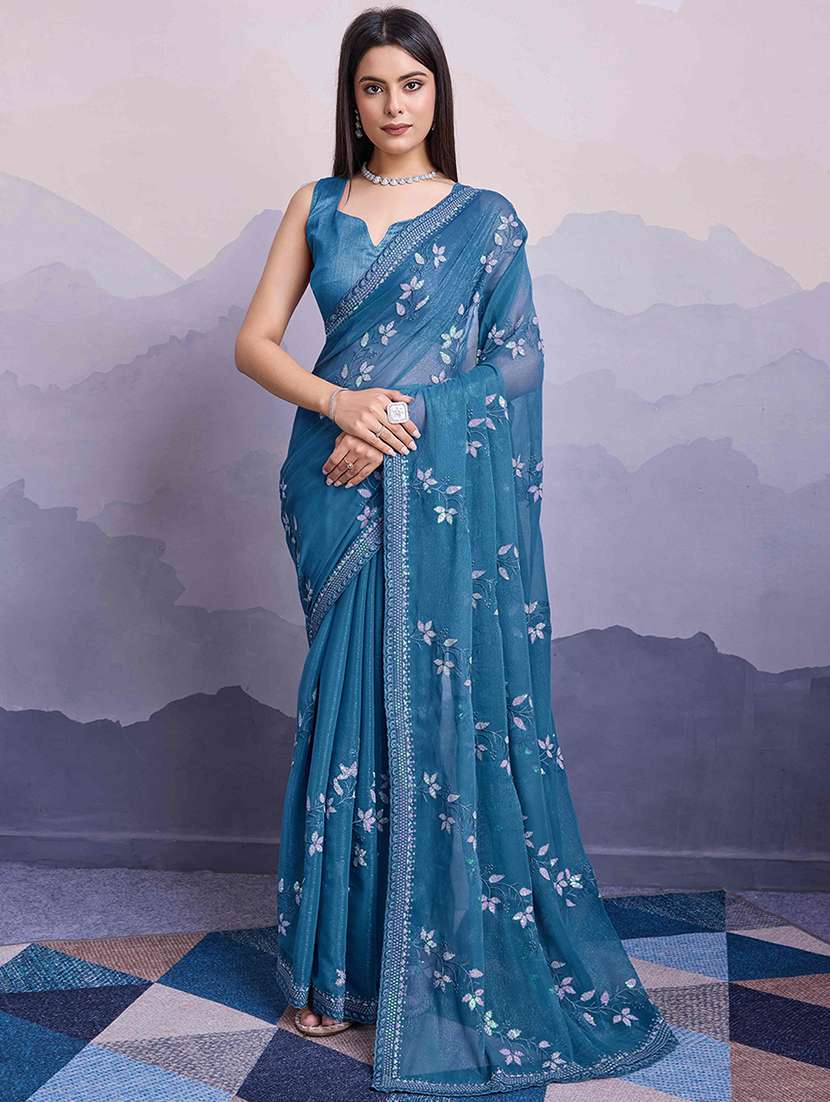 women blue embroidered saree with blouse