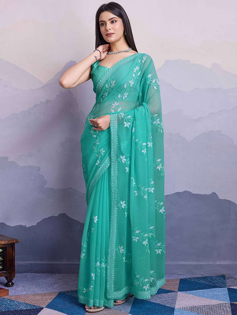 women sea green embroidered saree with blouse