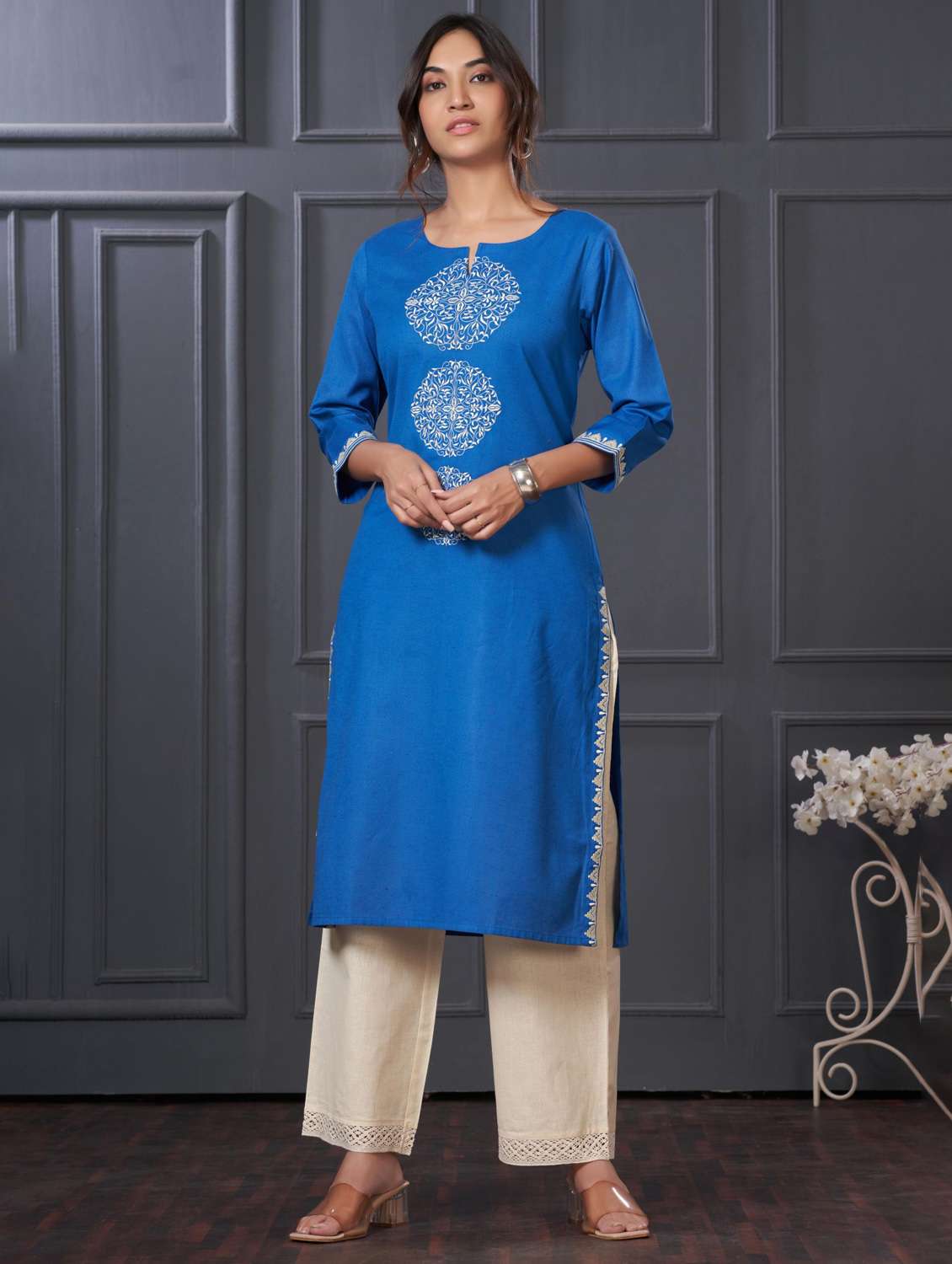 women embroidered three quarter sleeve kurta palazzo set