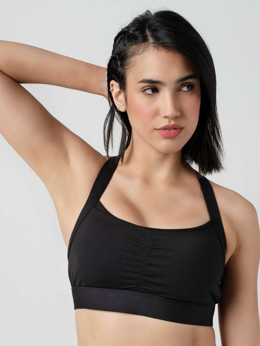 women solid lightly padded sports bra