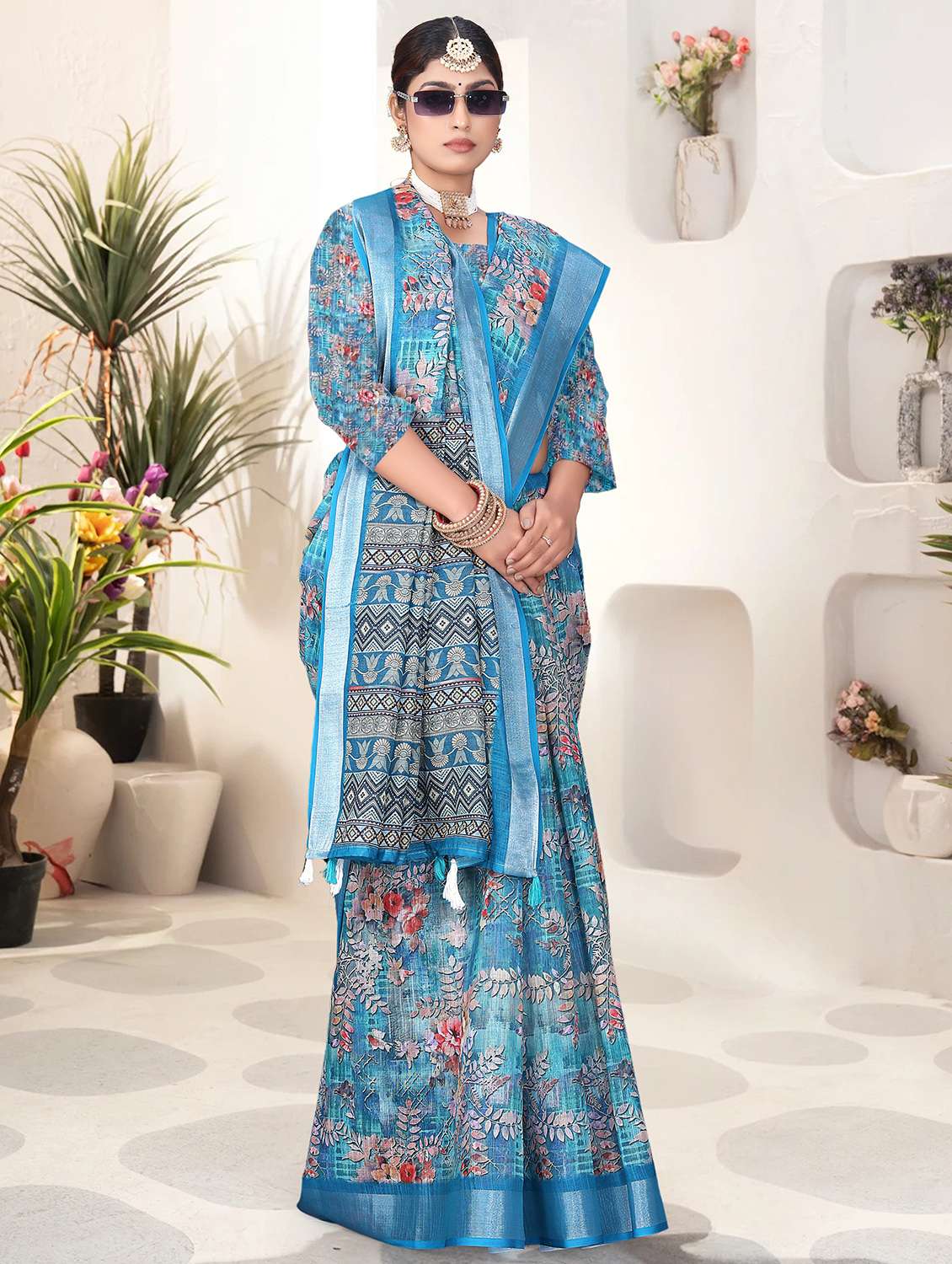 women blue printed saree with blouse