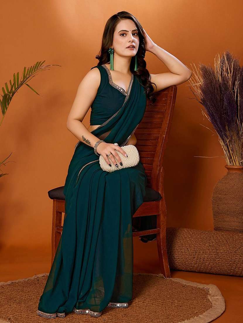 women teal embellished saree with blouse