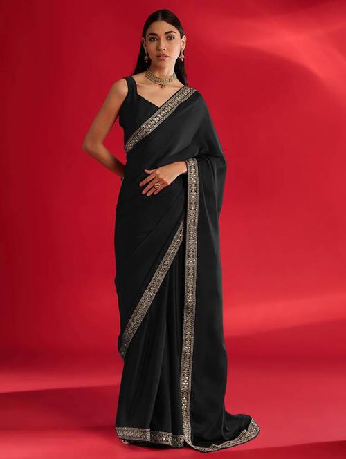 women solid with bordered saree with blouse - 21932135 -  Standard Image - 0