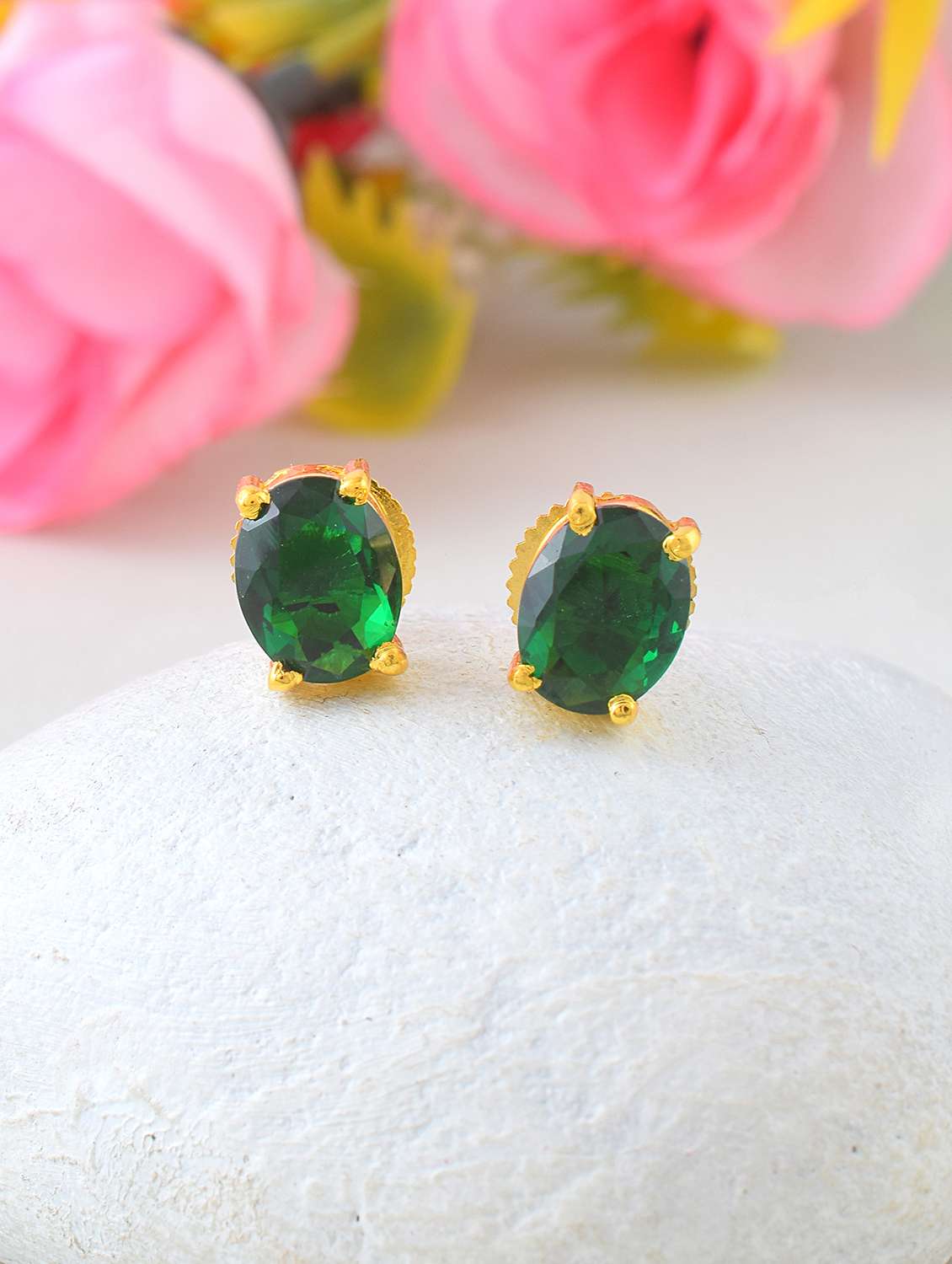 women green stone studded earrings