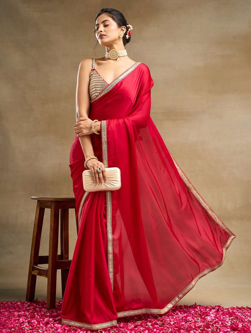 women solid with bordered saree with blouse