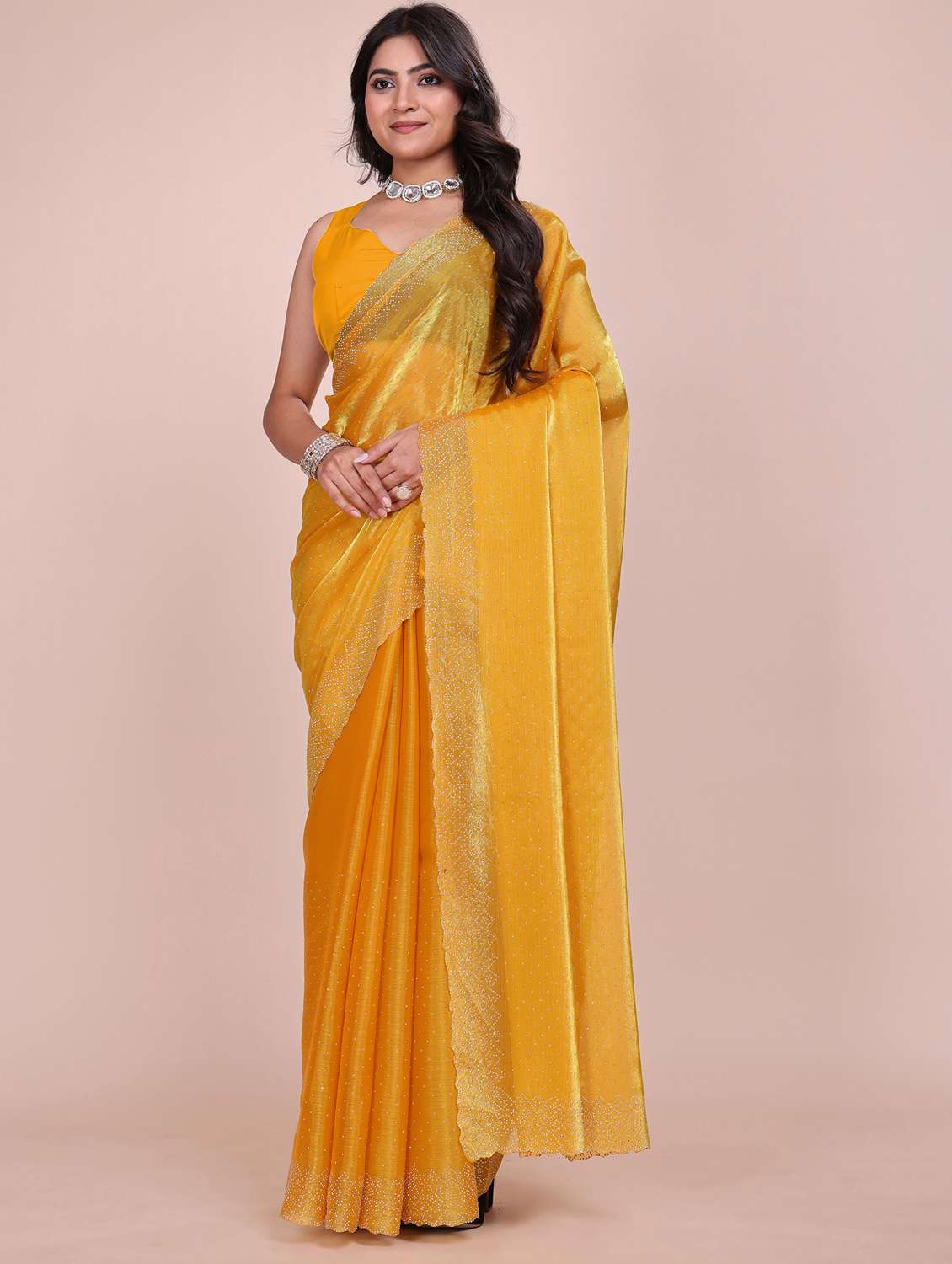 women solid with work embellished saree with blouse