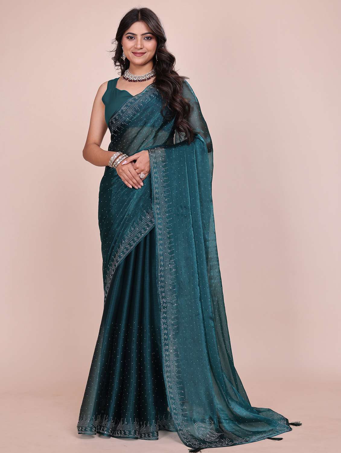women solid with work embellished saree with blouse