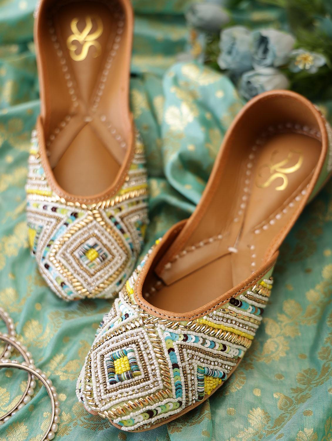 women embroidered slip on juttis