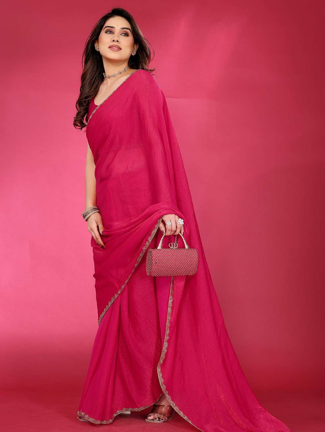 women solid embellished bordered saree with blouse