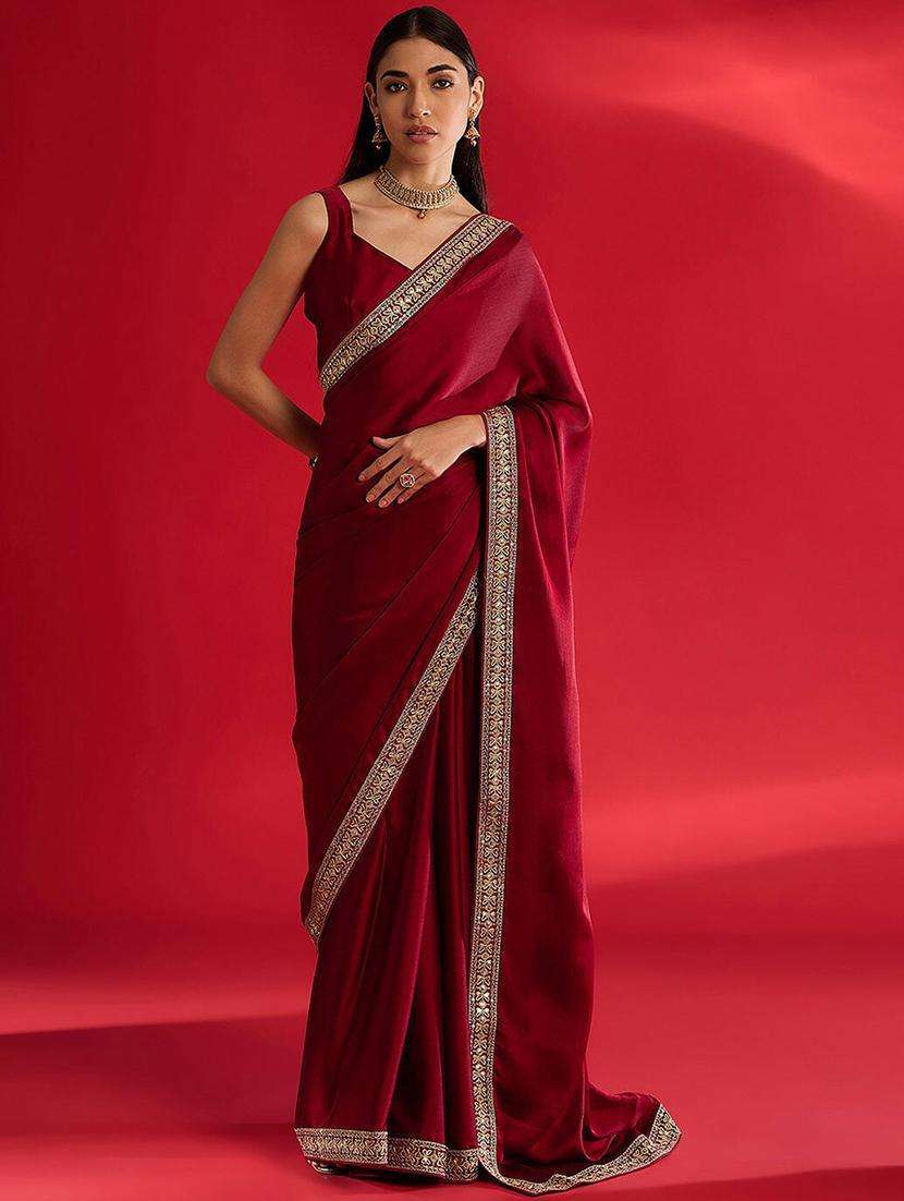 women solid with bordered saree with blouse