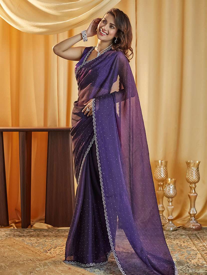 women solid with work embellished saree with blouse