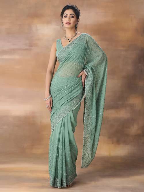 women solid with work embroidered saree with blouse