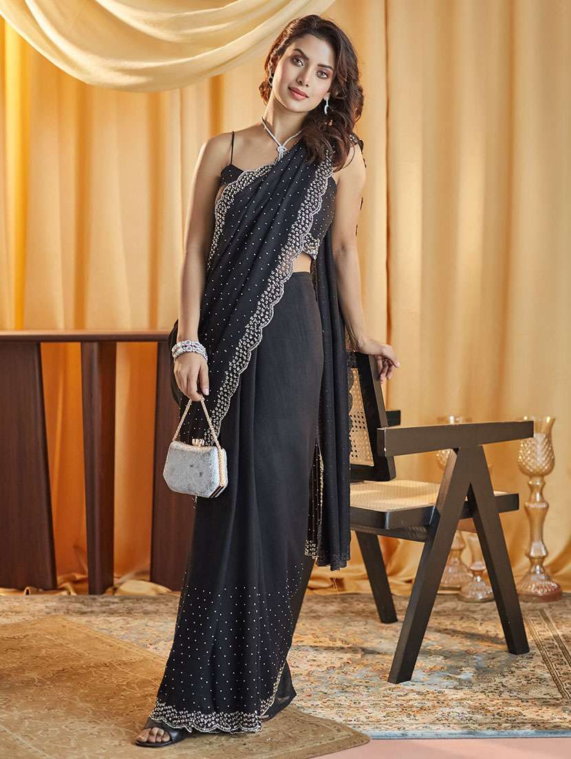 women solid with work embellished saree with blouse