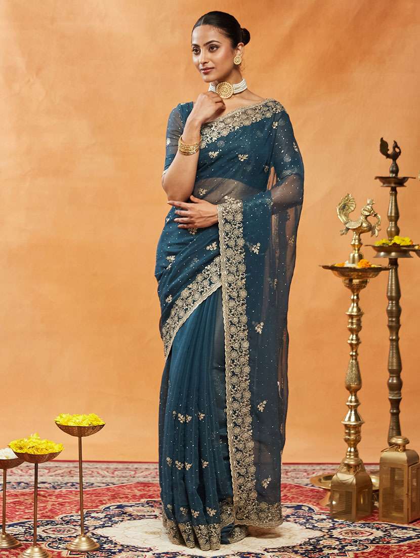 women solid with work embroidered saree with blouse