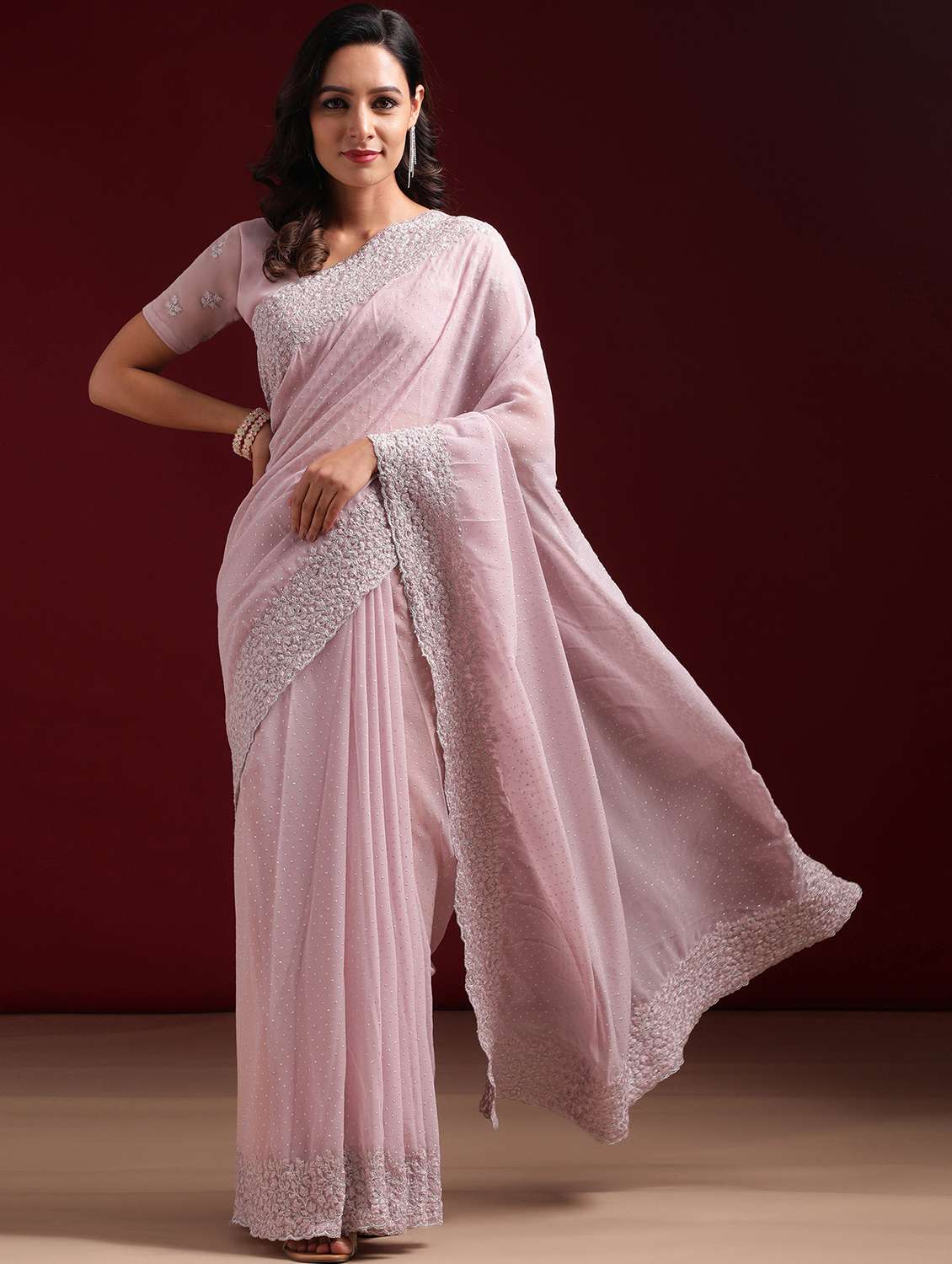 women solid with work embroidered saree with blouse