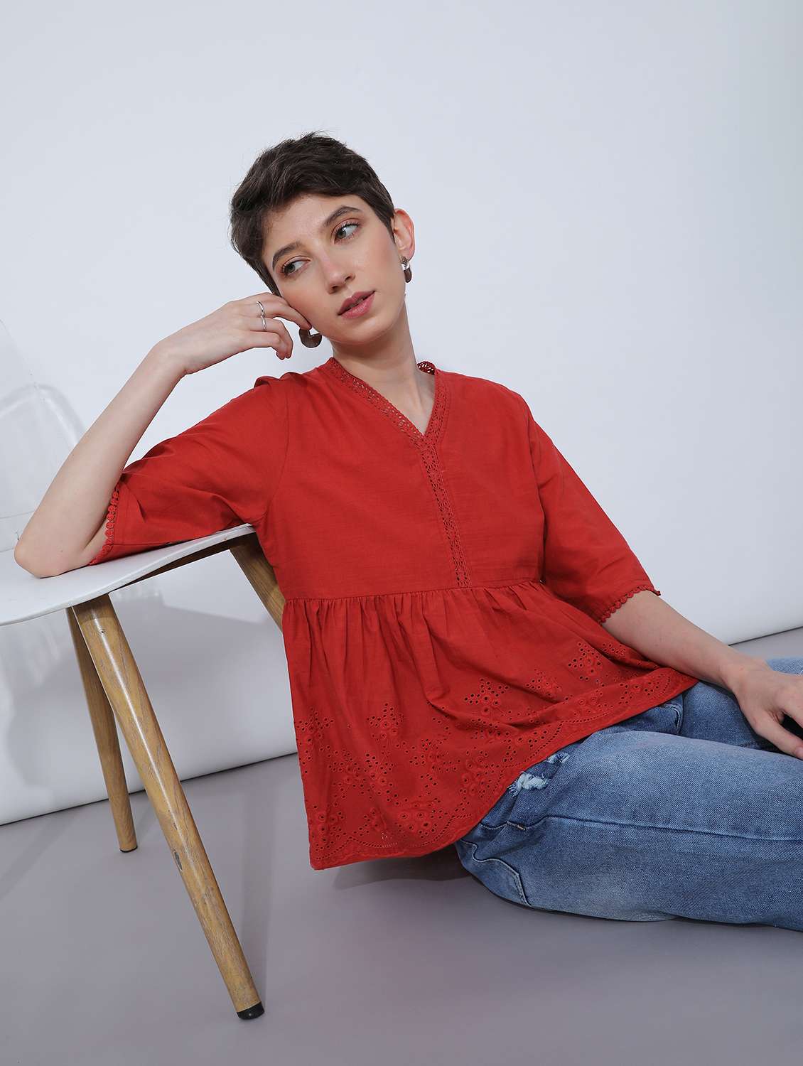 women red solid short sleeve schiffli flared top