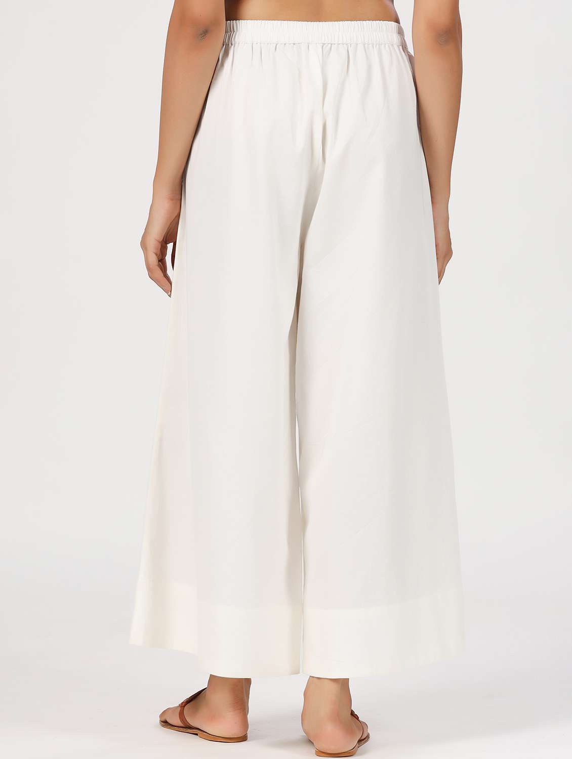 women white solid mid rise flared palazzo - 21956038 - Standard Image - 2
