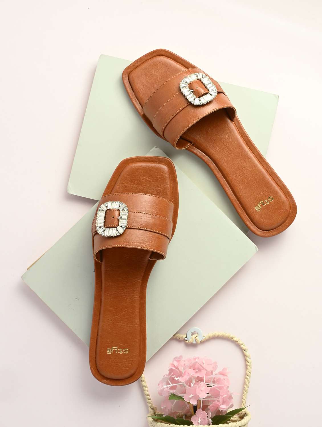 women tan slip on sandal