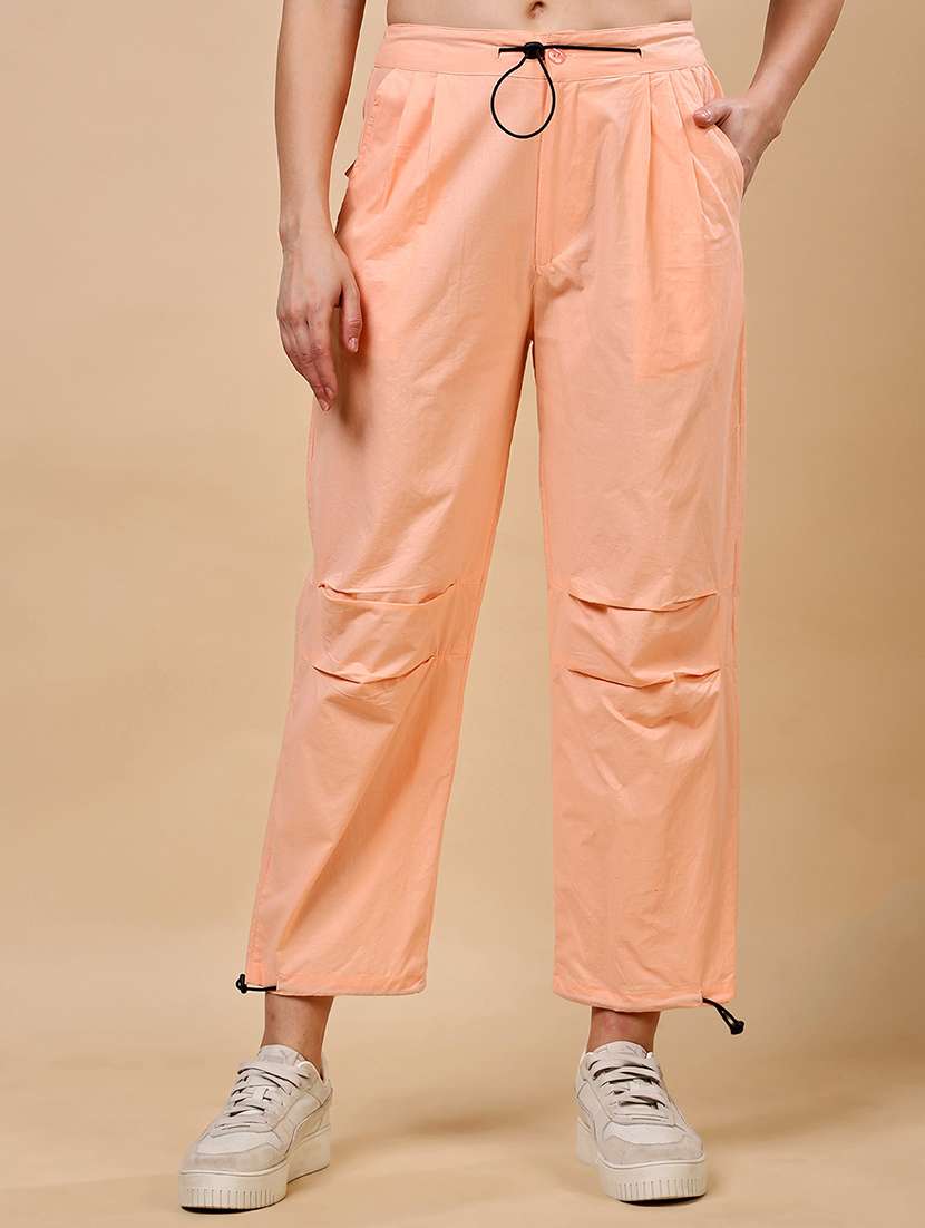 women orange solid mid rise parachute pant 