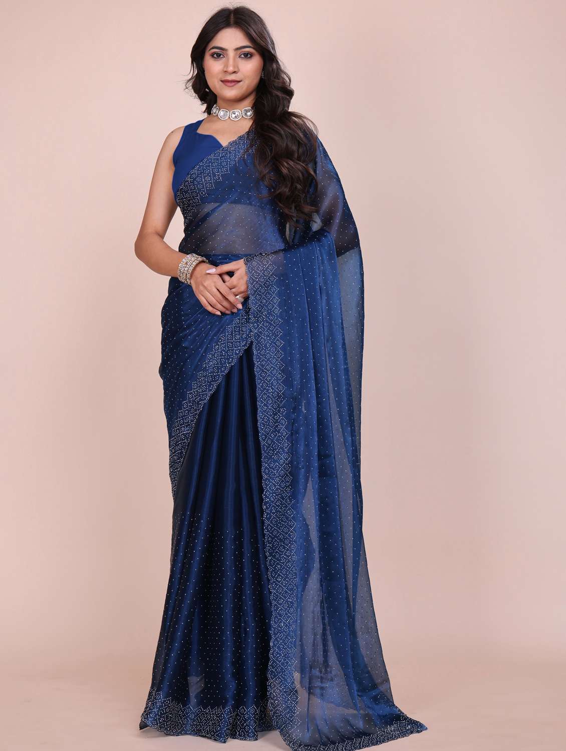 women solid with work embellished saree with blouse