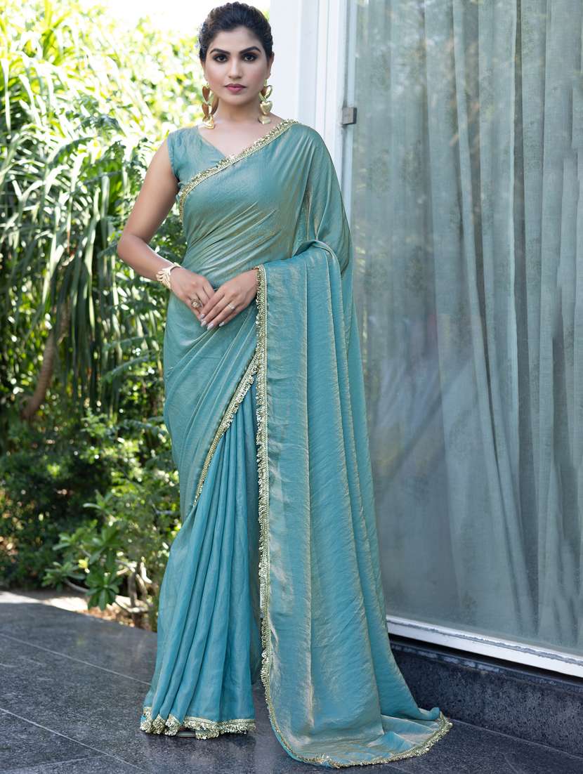 women solid with embellished bordered saree with blouse