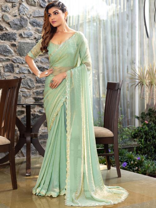 women solid with embellished bordered saree with blouse - 21962569 - Standard Image - 0