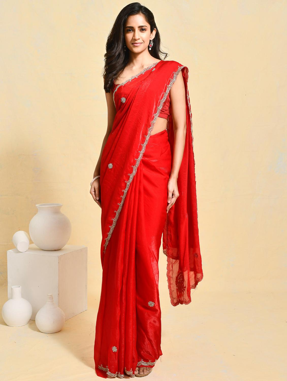 women solid with work embellished saree with blouse