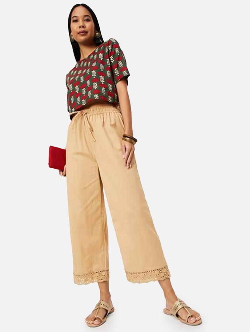 women solid mid rise flared palazzo - 21966960 - Standard Image - 2