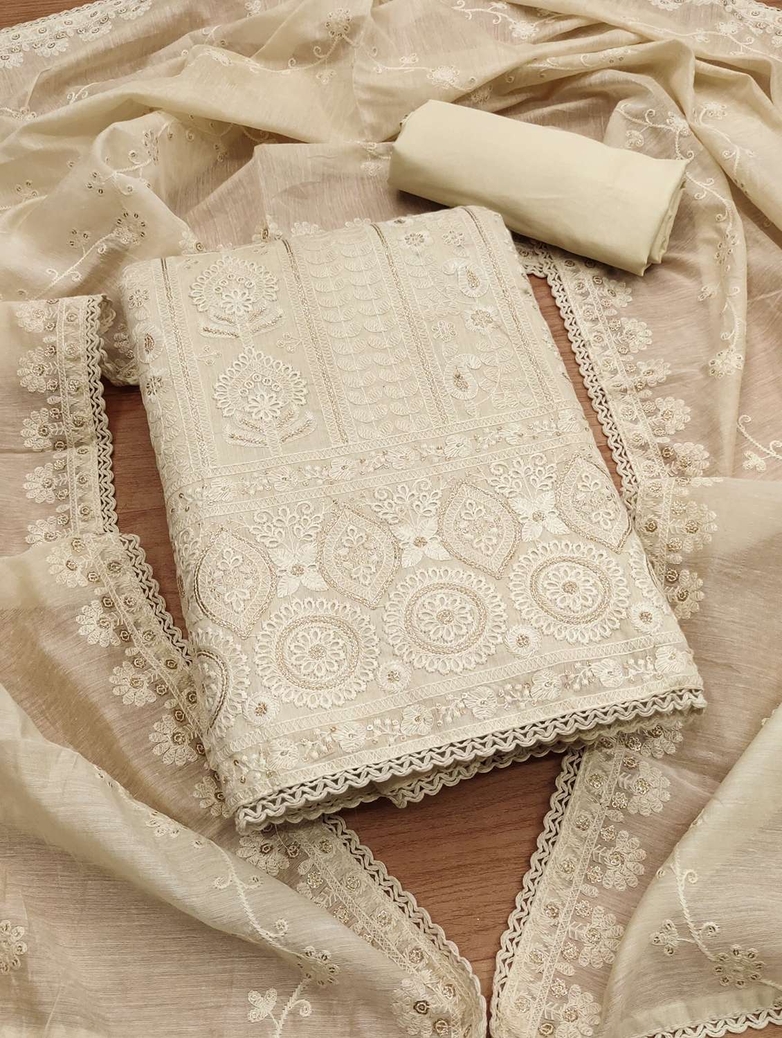 women embroidered unstitched suit set