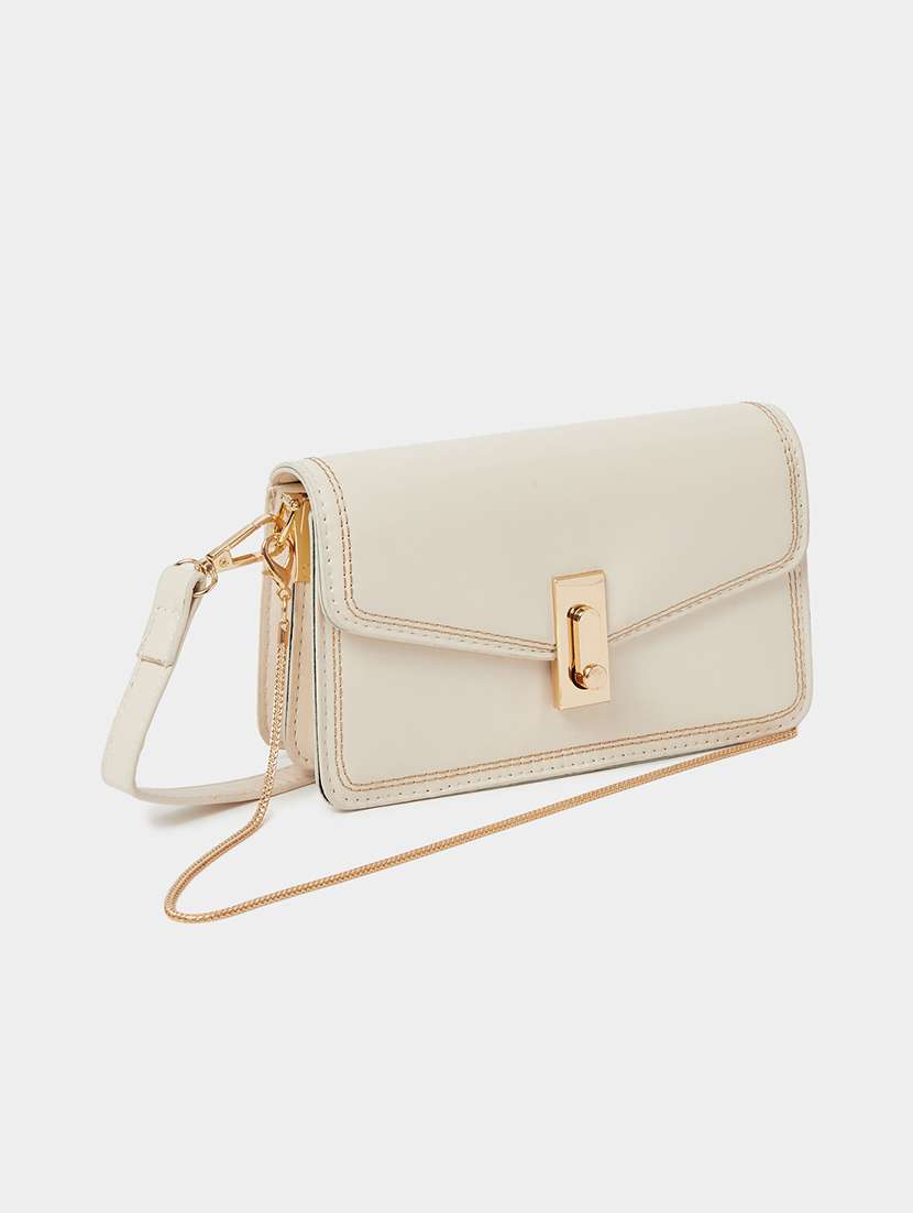 women off white solid sling bag