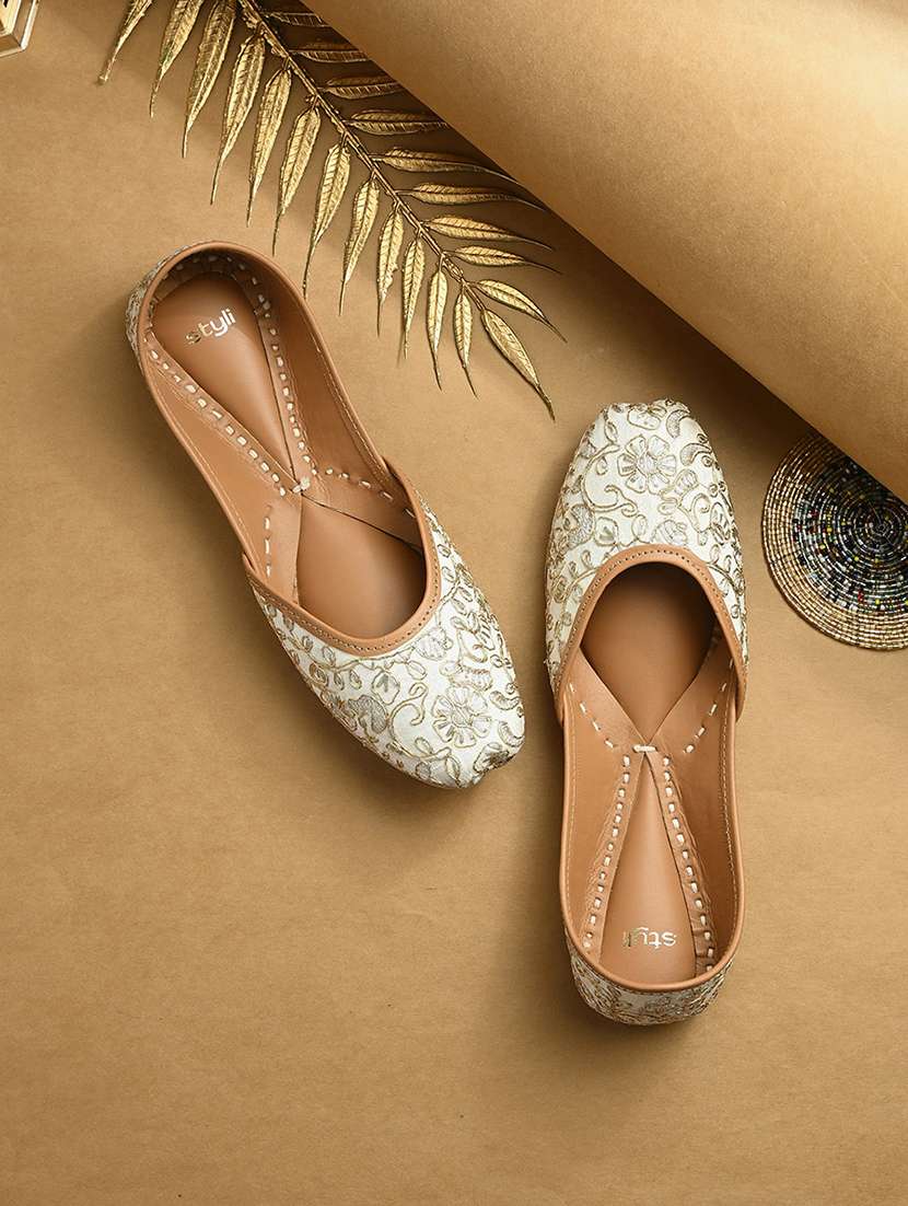 women cream embroidered slip on juti