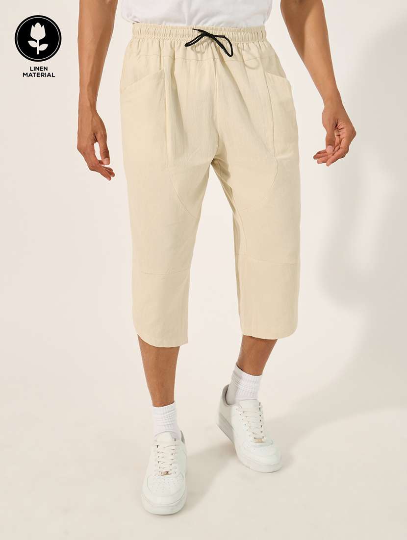 men cream solid mid rise three - fourth shorts - 21971516 - Zoom Image - 0