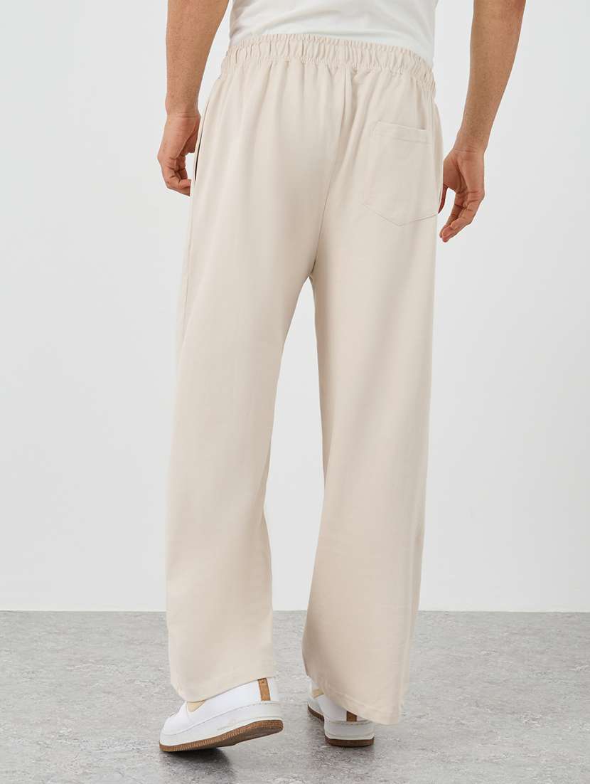 men solid mid rise relaxed fit track pant - 21971566 -  Standard Image - 2