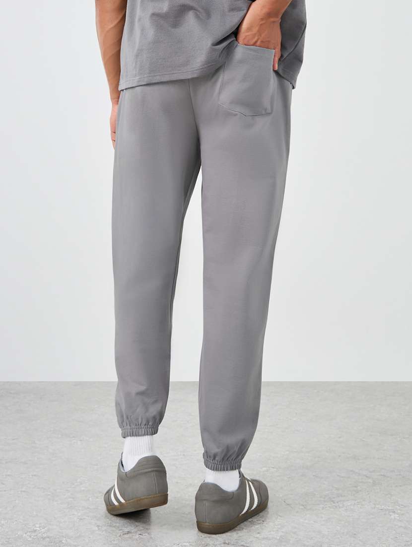 men typographic mid rise relaxed fit jogger - 21971581 -  Standard Image - 2