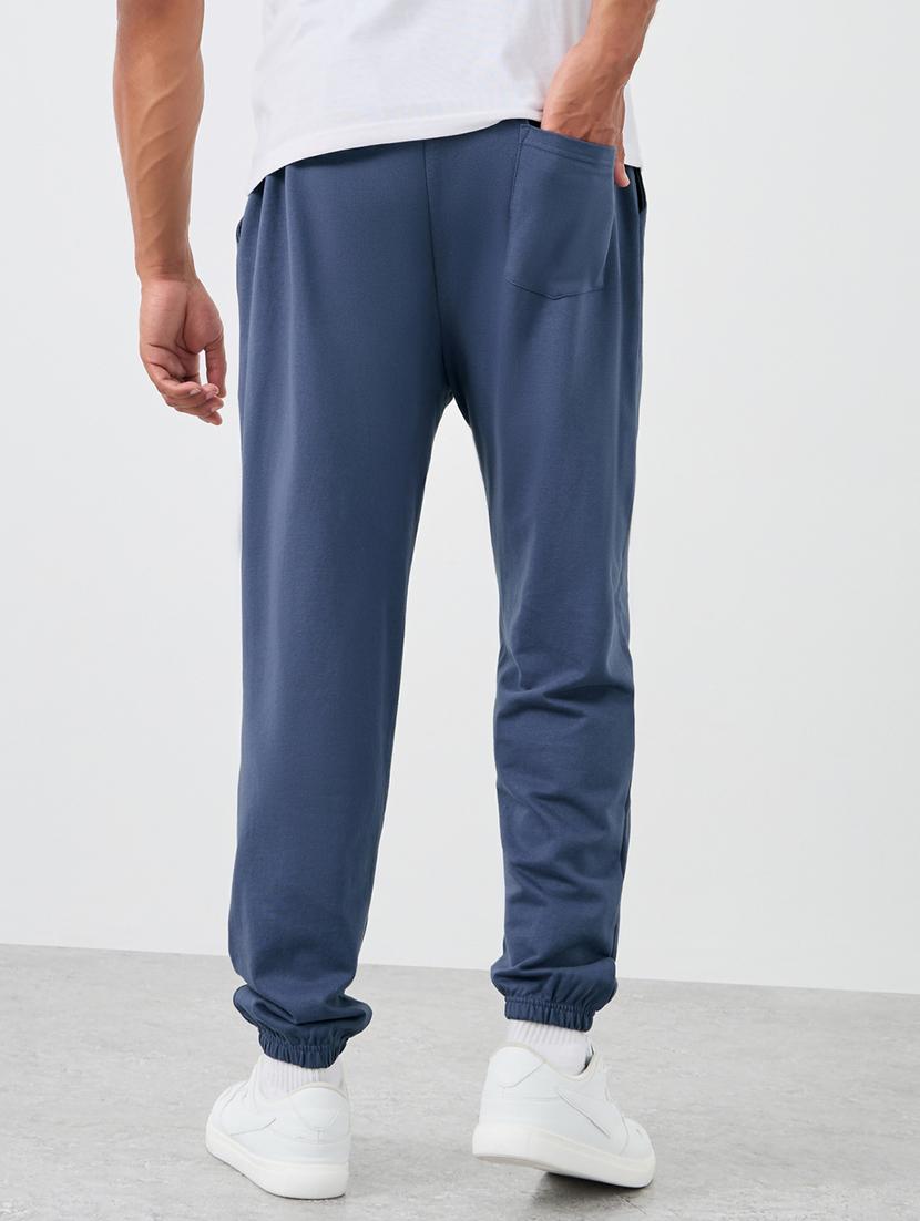 men typographic mid rise relaxed fit jogger - 21971582 - Standard Image - 2