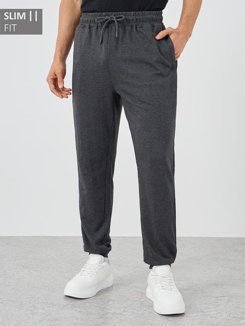 men solid mid rise slim fit jogger - 21971632 - Standard Image - 0