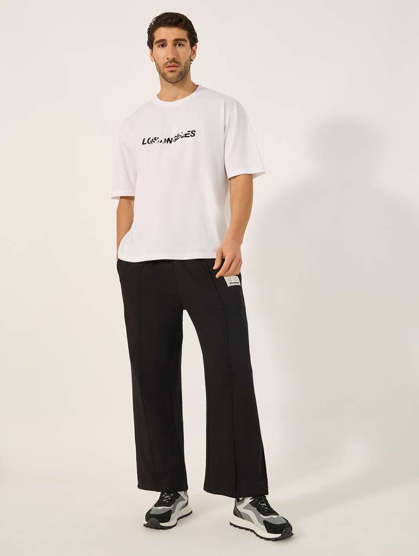 men solid mid rise loose fit full length track pant - 21971691 - Standard Image - 2