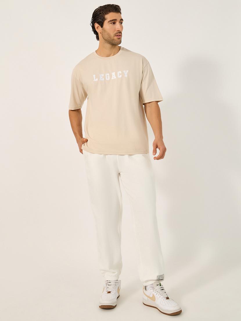men solid mid rise relaxed fit jogger - 21971692 - Standard Image - 2