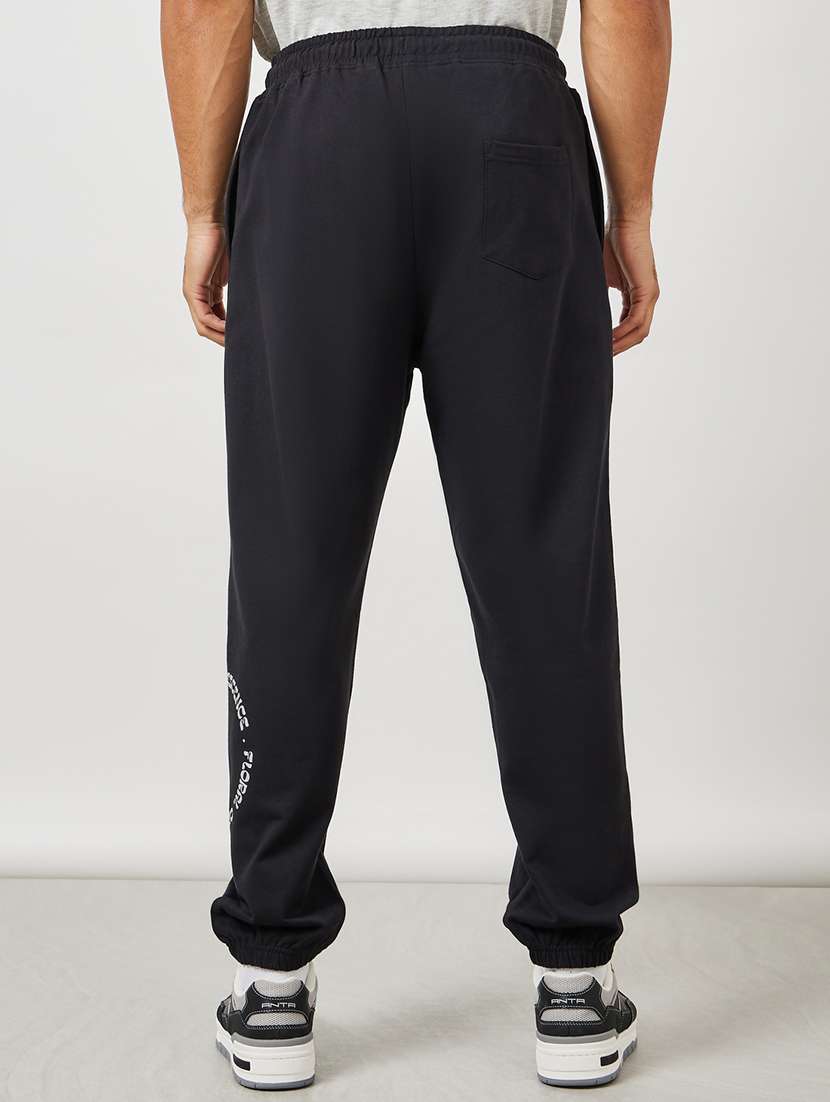 men placement print mid rise relaxed fit jogger - 21971694 -  Standard Image - 2