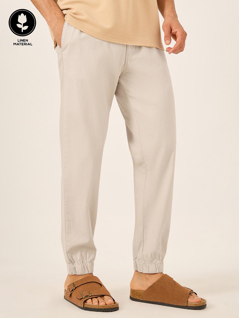 men solid mid rise relaxed fit jogger - 21971705 - Zoom Image - 0