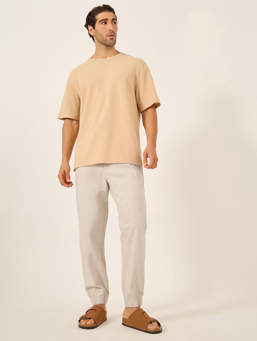 men solid mid rise relaxed fit jogger - 21971705 - Standard Image - 2