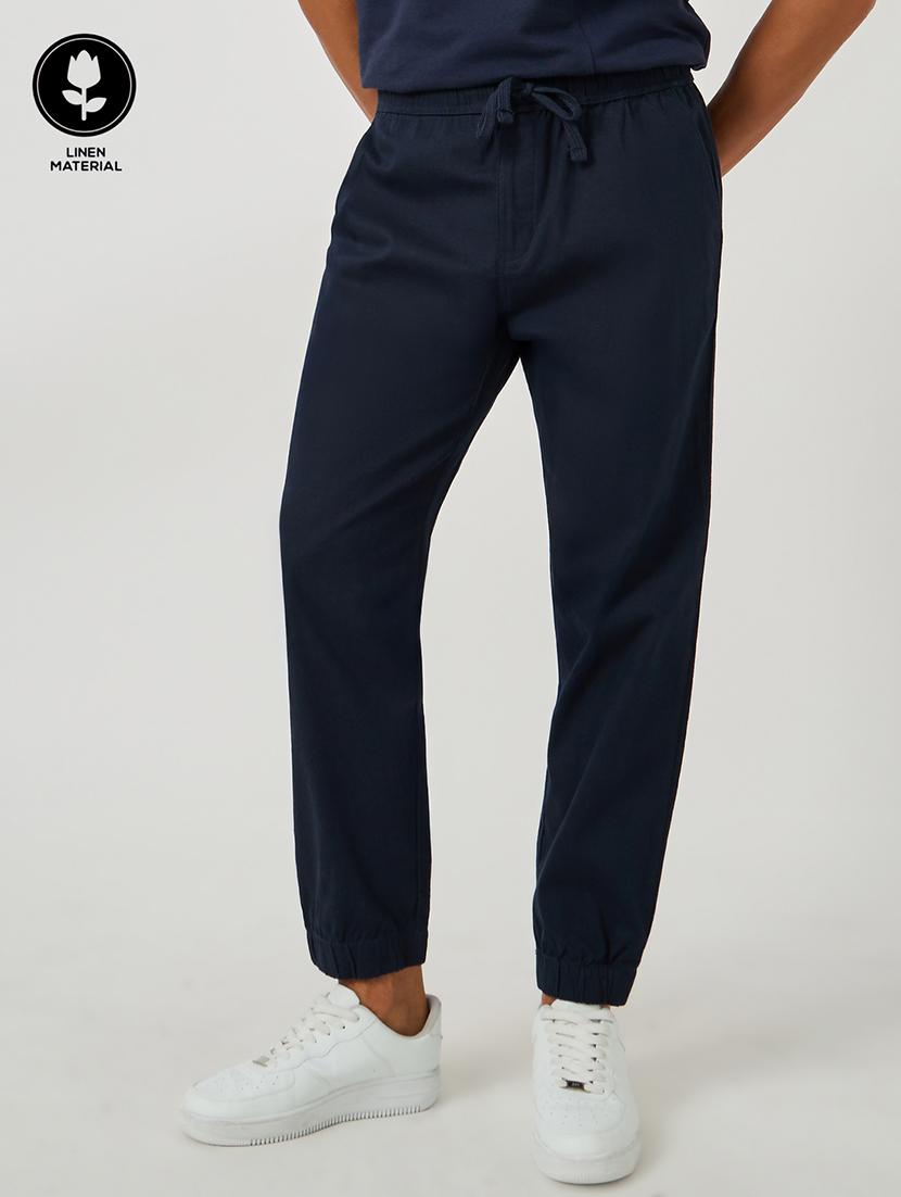 men solid mid rise relaxed fit jogger - 21971706 -  Zoom Image - 0